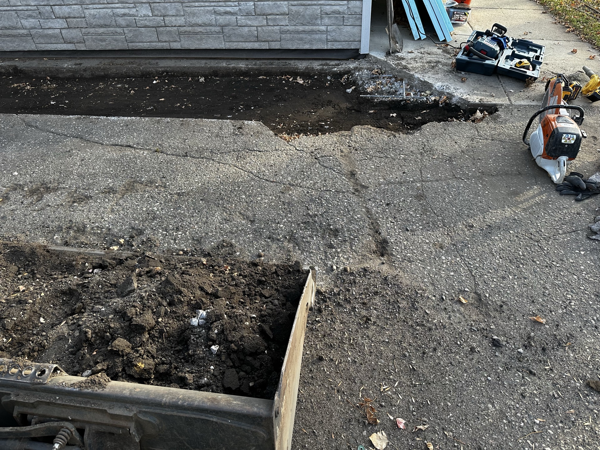 Concrete and asphalt site preparation