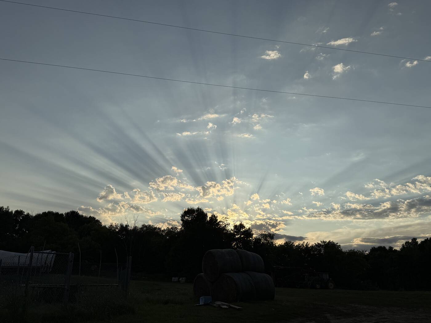 Sunset over the Long Prairie farm at the end of a work day