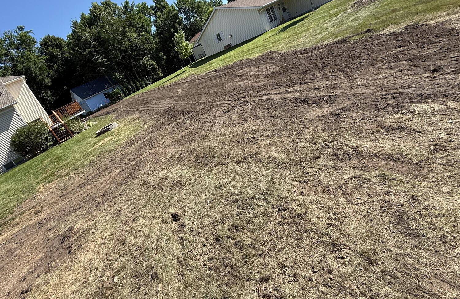 Ground leveled and graded after stump removal in St. Joseph MN