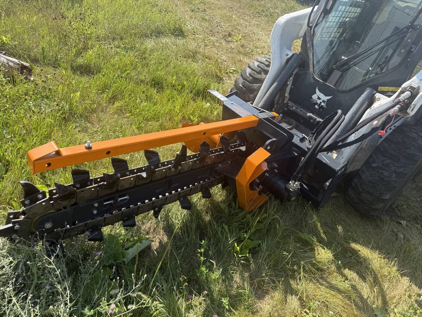 Dedicated trencher attachment for our Bobcat skid steer
