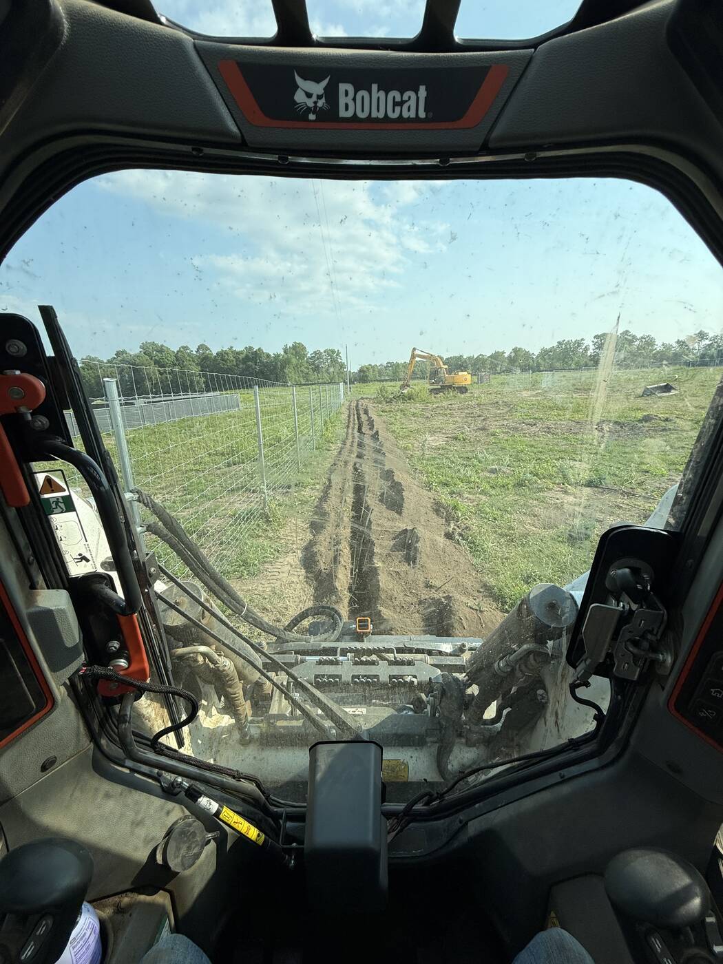 1,000+ Feet of Trenching Along a Fence Line in Long Prairie, MN