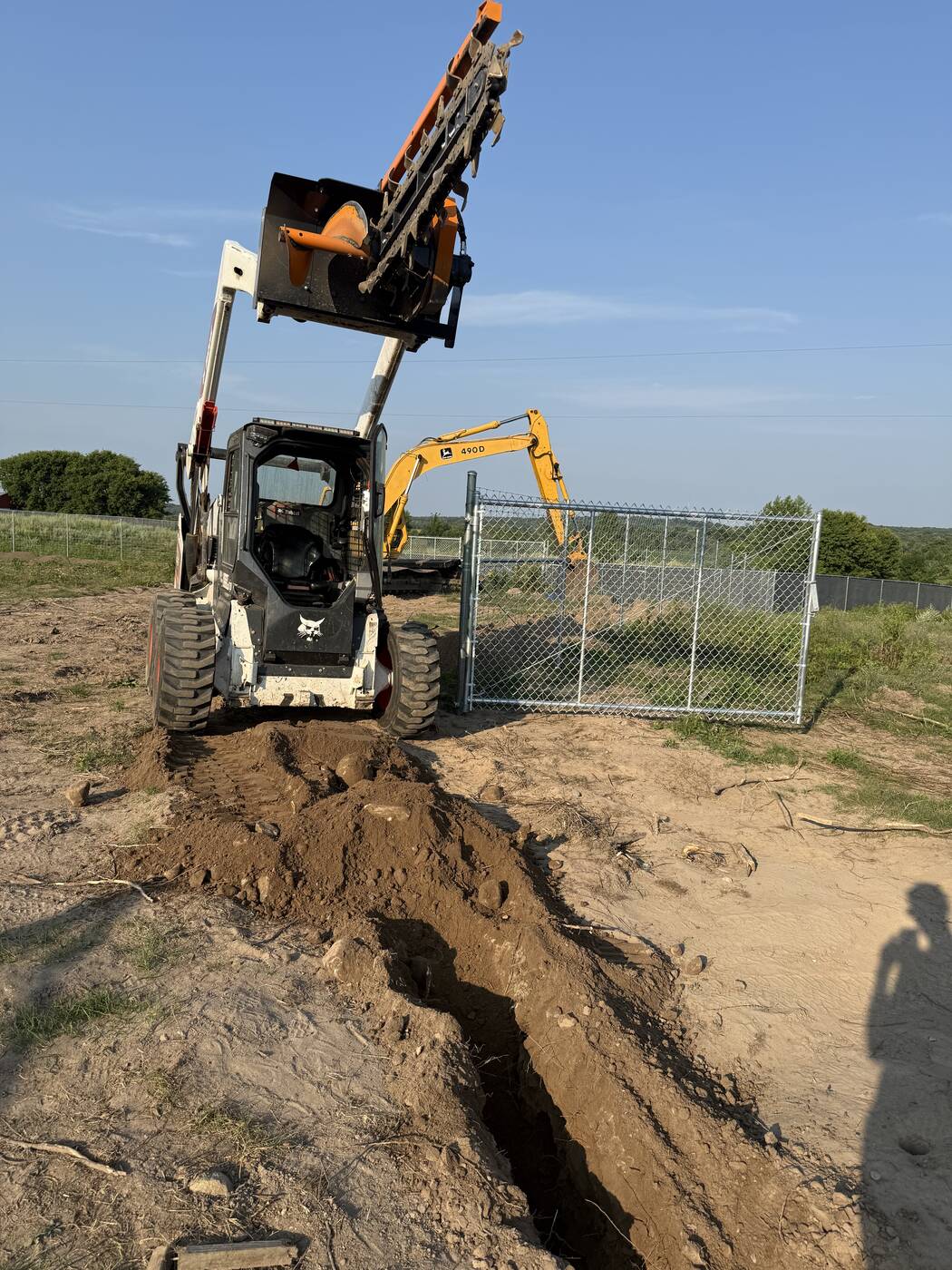 Trencher raised after finishing a section